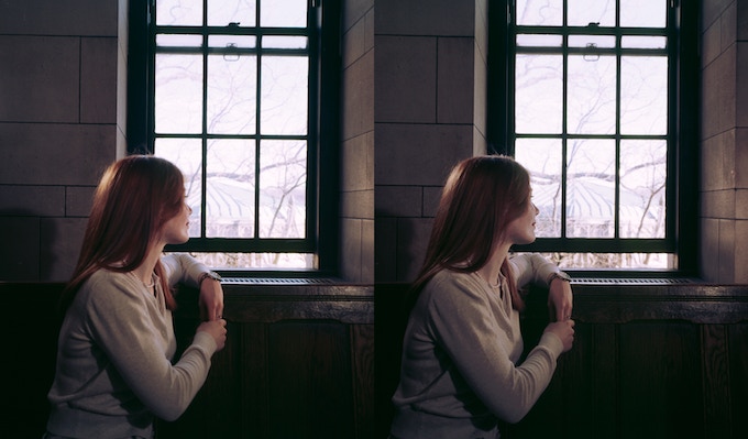 Woman looking out of window